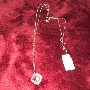 Brand new silver Kacy Necklace with iri glass